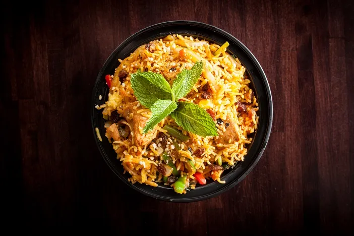 Chicken Biryani delivery Winnipeg from Clay Oven — fragrant basmati rice